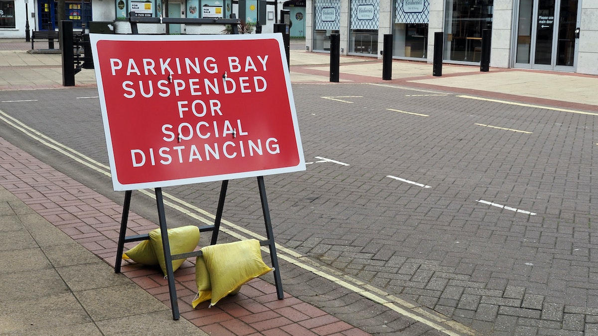 Sign showing social distancing in city